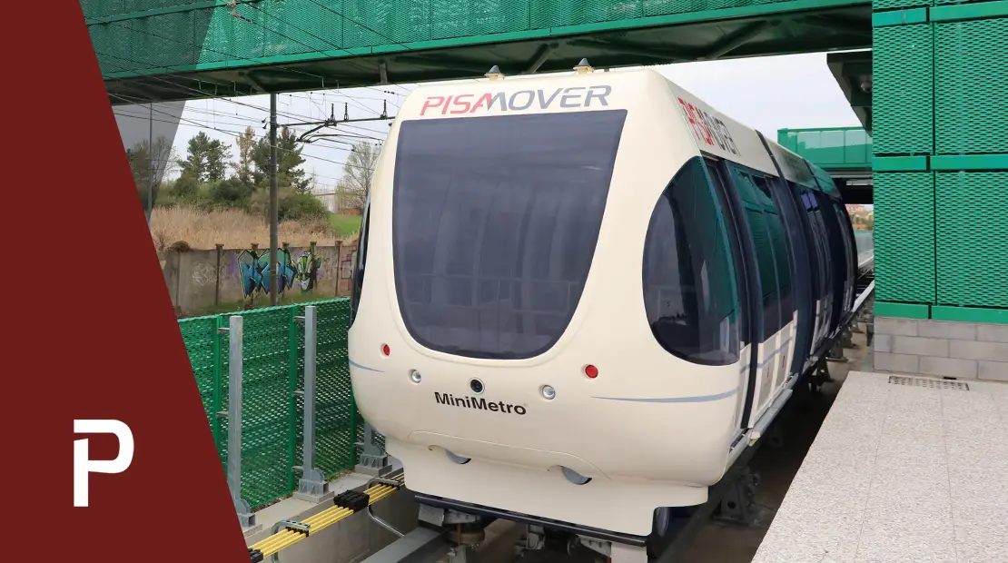 Convoglio Pisa Mover in arrivo alla stazione, visto dal binario.